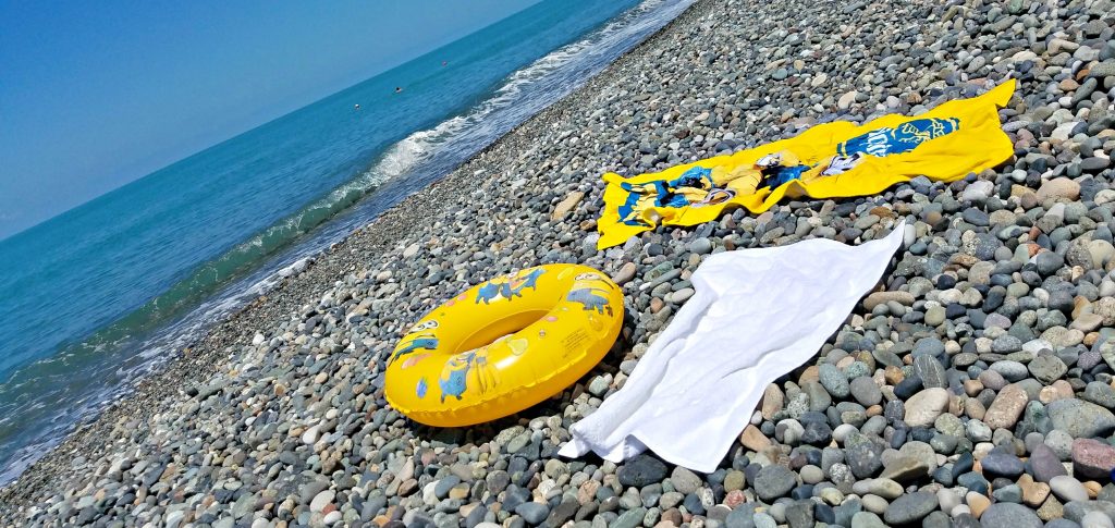 Sarpi beach with towels