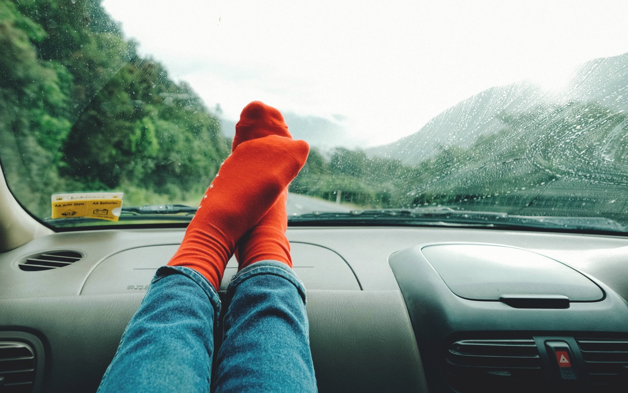 Road trip activities, in the car with feet on the dash