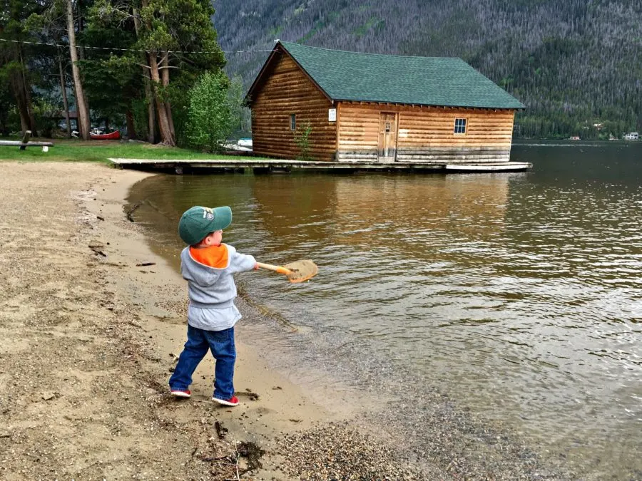 Shoveling sand in Grand Lake