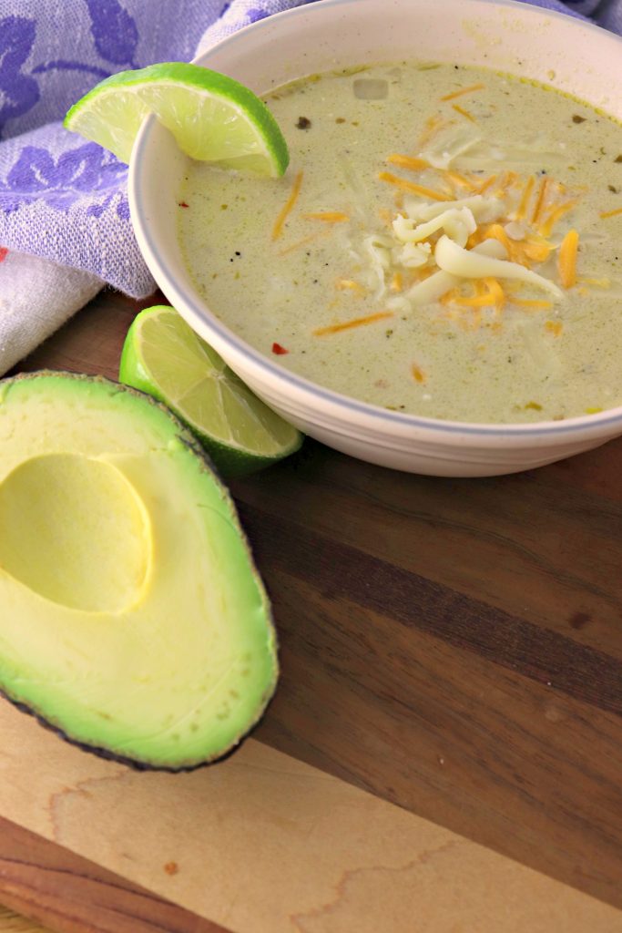 Green chili chicken chowder vertical with avocado