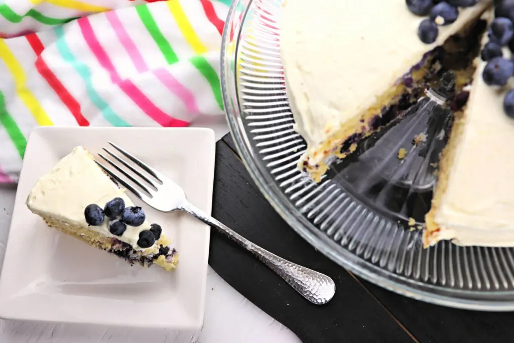 Try a piece of delicious Low carb lemon blueberry cream cake for a keto diet or gluten-free dessert. #ketocake #lowcarbrecipes