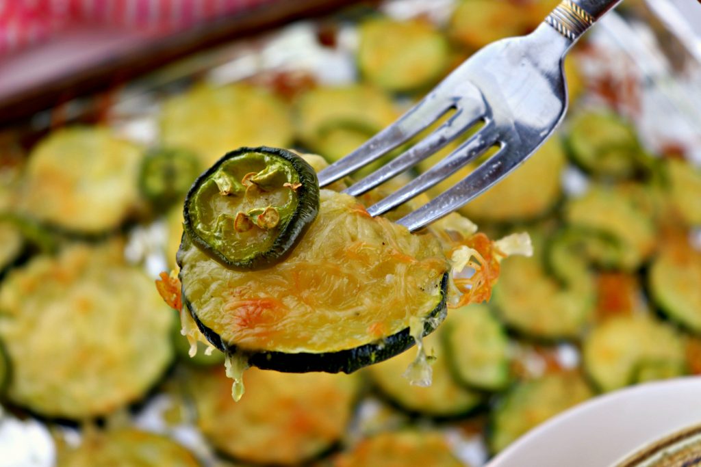 Bite of low carb grilled garlic parmesan zucchini