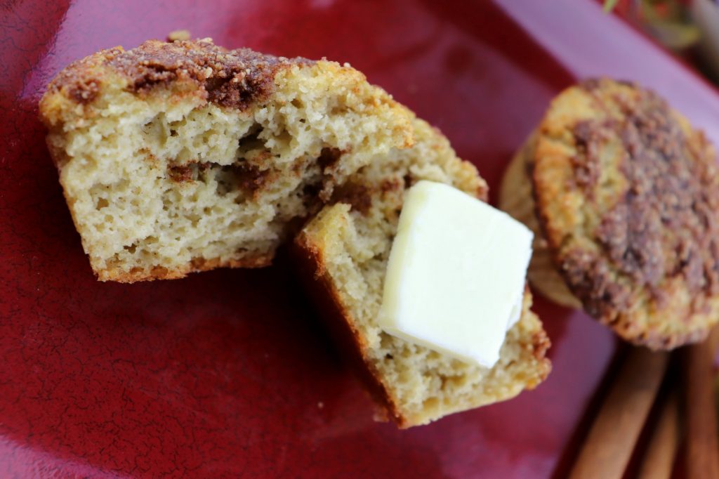 Open low carb coffee cake muffin with butter, closeup