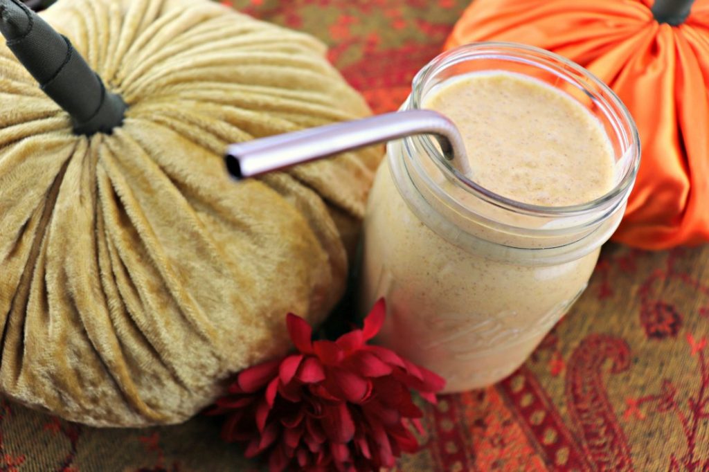 Keto pumpkin spice breakfast smoothie, straw close-up