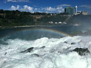 Rainbow over the crash of the falls. Niagara Falls with kids is the perfect family vacation. #operationusparks #explorermomma