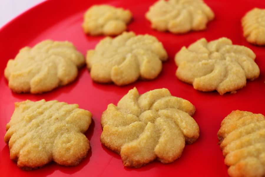 Keto Butter Spritz Cookies are gluten-free, sugar free, easy, and delicious! Buttery and melt in your mouth, the perfect low carb recipe. Christmas cookies recipes we love. #lowcarbrecipes #cookierecipes