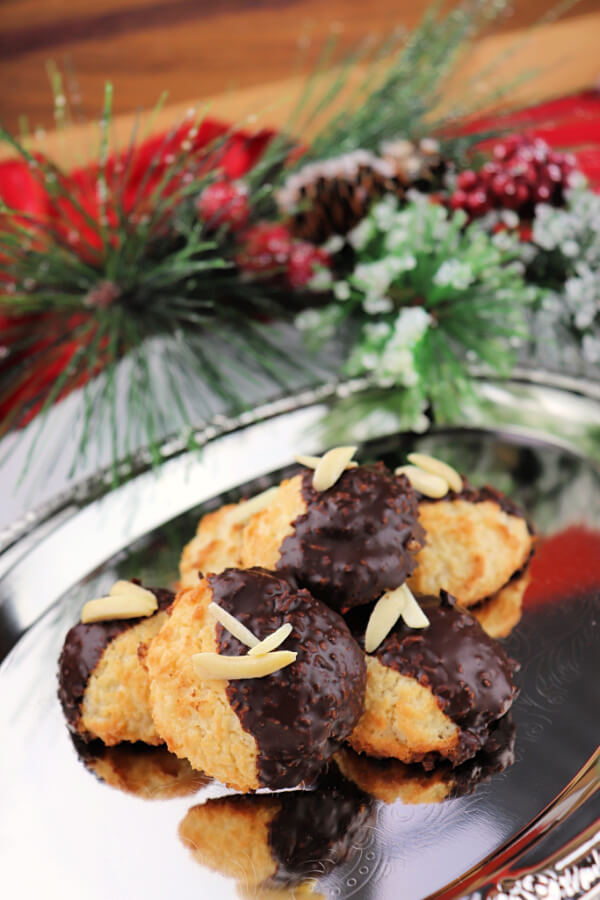 Keto coconut macaroons are low carb holiday delights. Coconut, almonds, and chocolate make a fabulous gluten-free holiday recipe. #ketocookies #ketochristmas