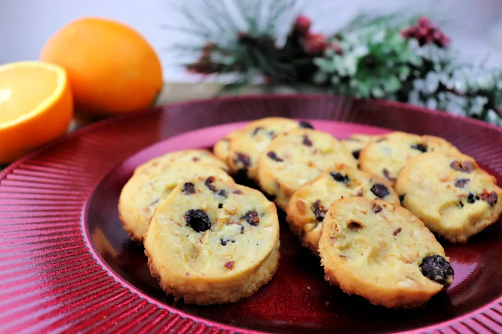 Keto cranberry orange shortbread cookies are fabulous and easy. Slice and bake low carb beauties can be baked off whenever you need them. #lowcarbcookies #ketodesserts