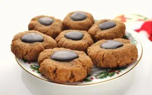 Thumbprint keto peanut butter cookies are fabulous for low carb snacks during the holidays. Stick to your keto diet with these chocolate peanut butter delights. Gluten-free, sugar-free, yum! #ketodiet #ketorecipes