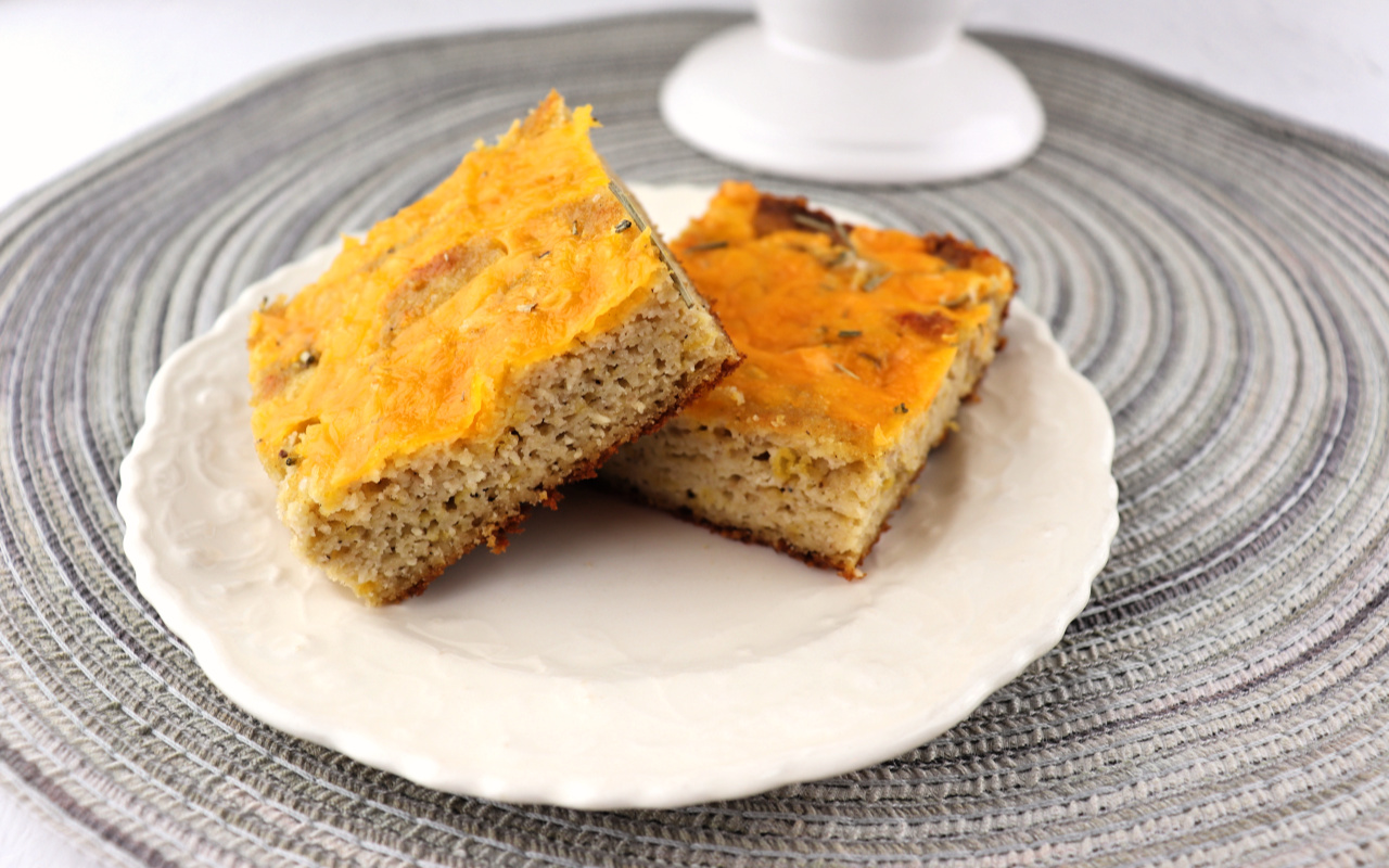 Keto Cheddar Focaccia is the perfect low carb recipe alongside your favorite keto soup or salad. Craving bread? Try this and your keto diet will thank you. #ketobread #lowcarbbread