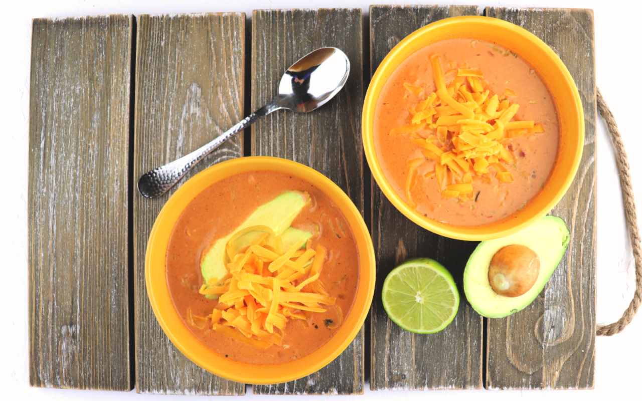 Keto taco soup. This delicious low carb soup tastes literally like a warm taco in a bowl! Gluten-free and super-easy, your family will love this recipe! #ketosoup #lowcarbdinners