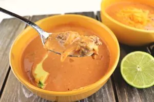 A spoonful of keto taco soup. Easy, kid-friendly, low carb recipe. Perfect for gluten-free diets and a healthier option. #ketosoup #ketorecipes