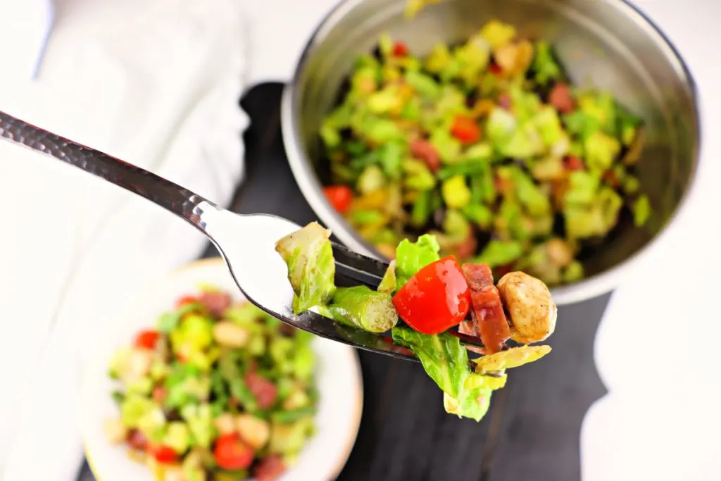 Keto Antipasto Salad is a beautiful, flavorful low carb lunch! Perfect easy recipe for picnics and potlucks. #antipastosalad #saladrecipes