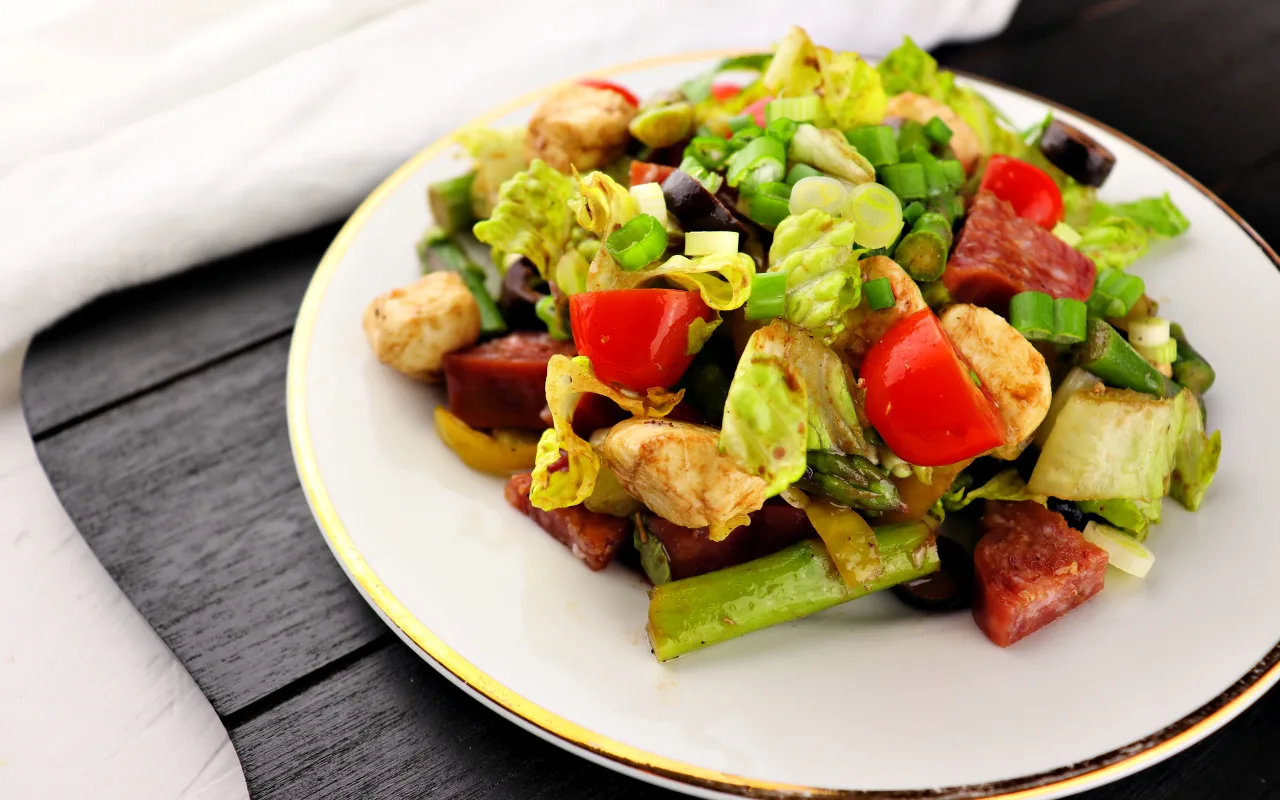 Keto Antipasto Salad is a delicious, refreshing low carb lunch. Get your veggies in with a gluten-free fabulous salad! #lowcarbsalad #ketolunch