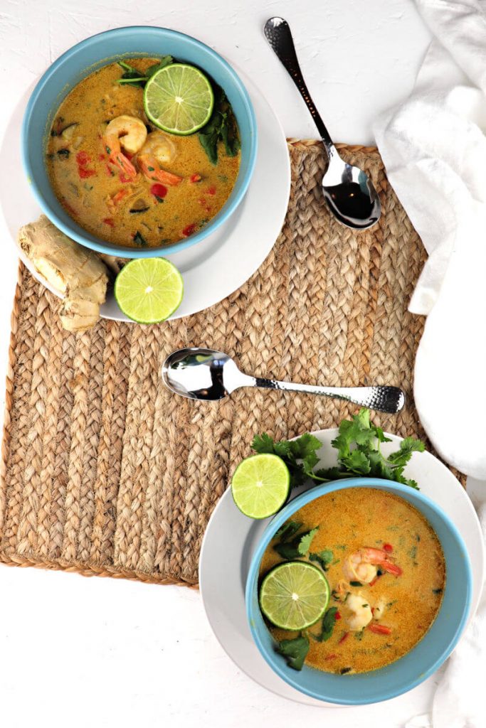 Creamy low carb Thai shrimp soup is dairy-free, gluten-free, keto, and an amazing blend of flavors with a punch of red curry. #ketosoup #lowcarbsoup
