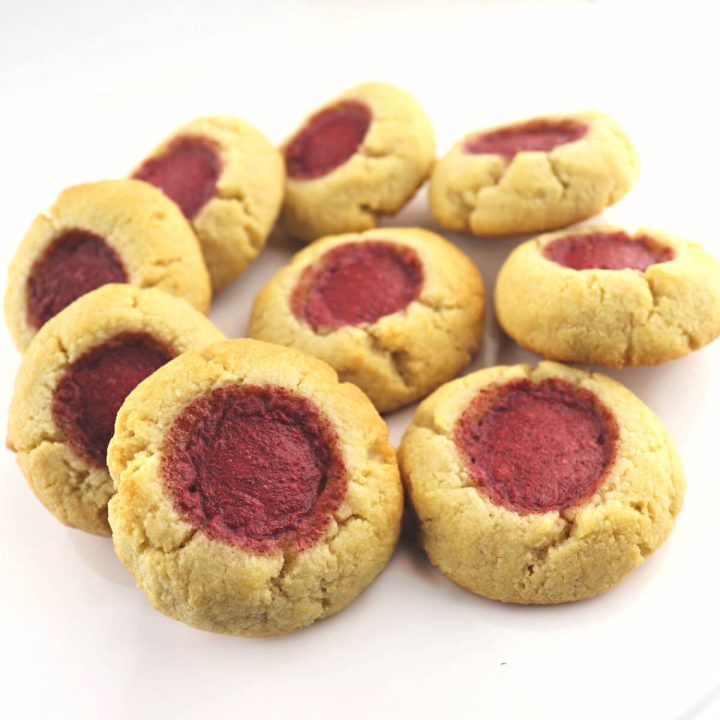 Butter and jam keto thumbprint cookies are a sweet low carb kid-friendly treat perfect for tea, picnics, or holidays! #ketocookies #lowcarbcookies