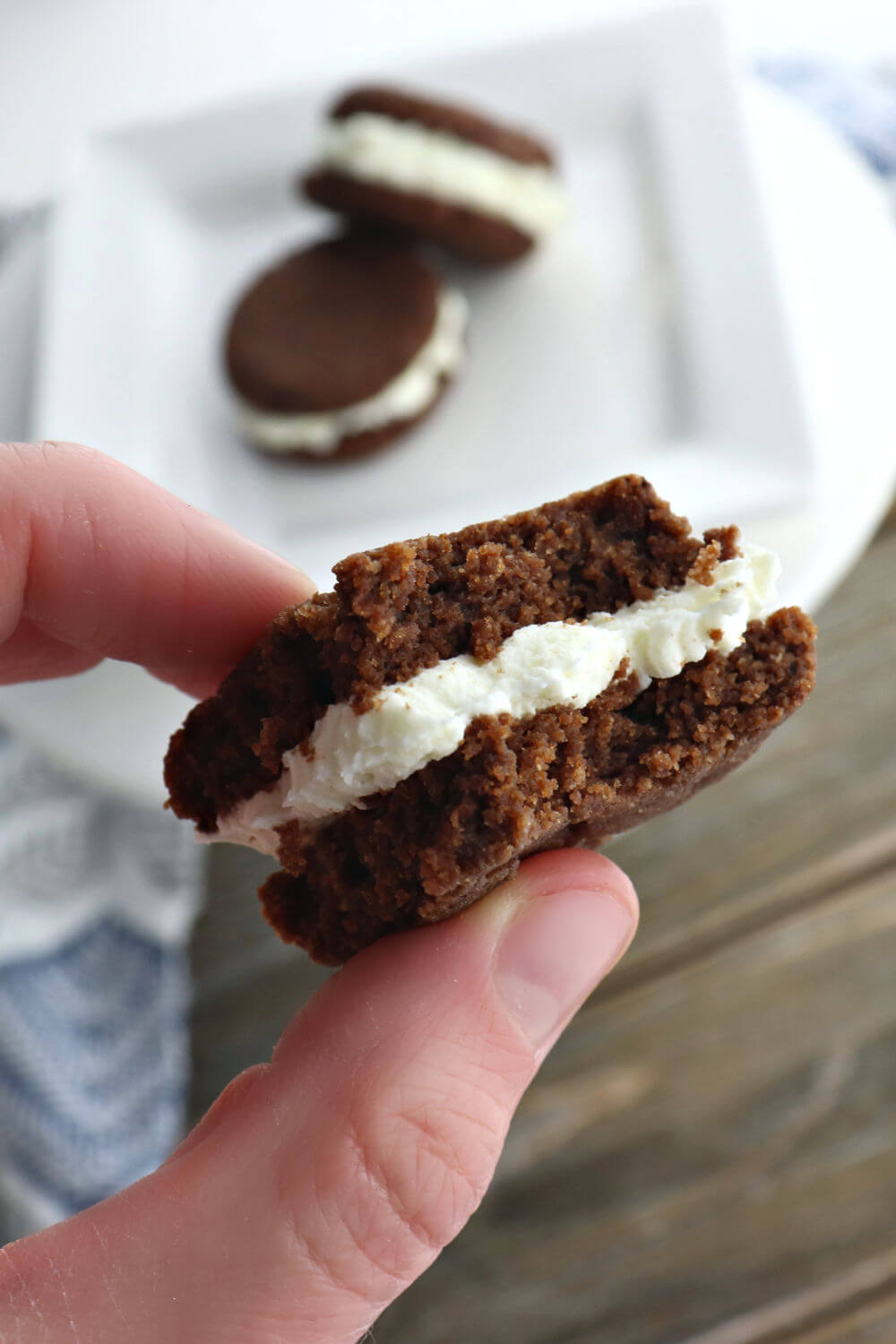 Take a bite of a low carb keto chocolate sandwich cookie and your taste buds will thank you. A perfect gluten-free snack with a sugar-free decadent filling. #ketosnacks #ketodesserts #lowcarbdessertsketo