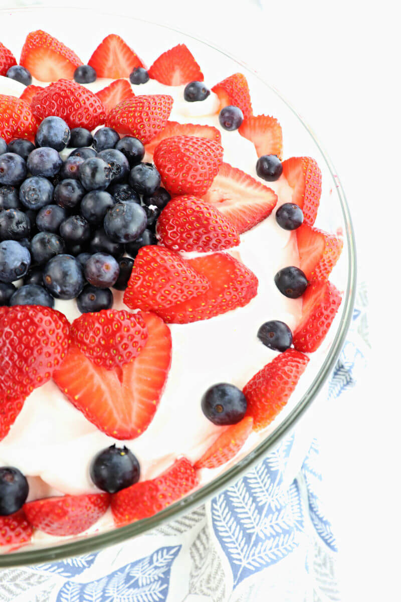 The best low carb keto berry trifle is a beautiful summer gluten-free centerpiece for Memorial Day, the Fourth of July, or any party or picnic. Impress with a delicious creamy sugar-free dessert. #ketotrifle #ketodessert #lowcarbdessert 