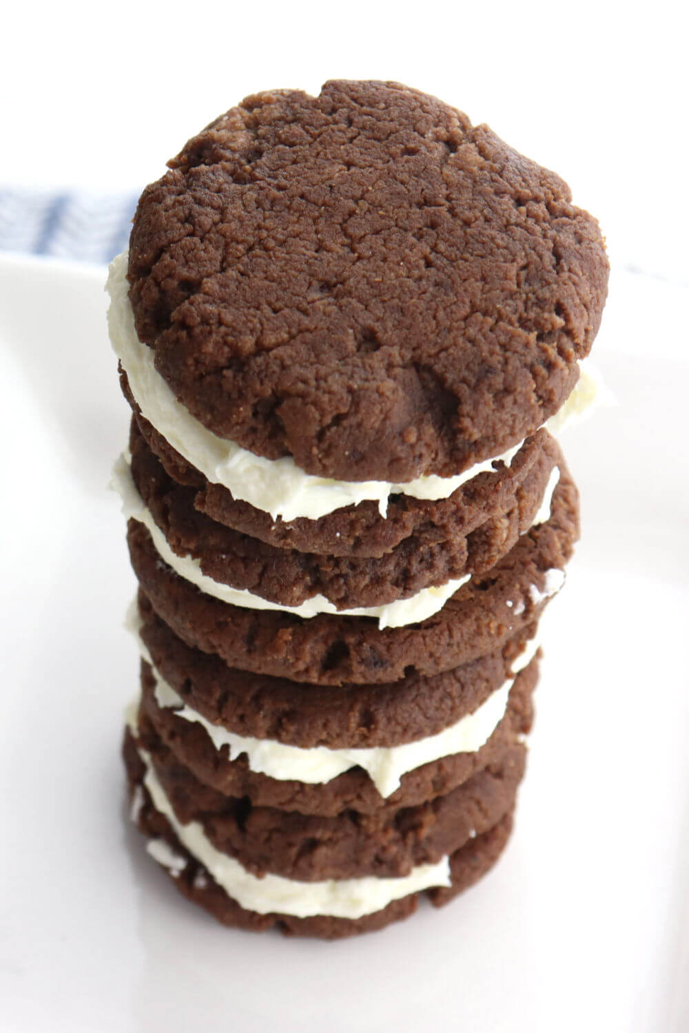 Low carb keto chocolate sandwich cookies are a delicious gluten-free sweet treat. Curb those cravings and enjoy a sugar-free keto way of eating. #lowcarbdesserts #ketorecipes