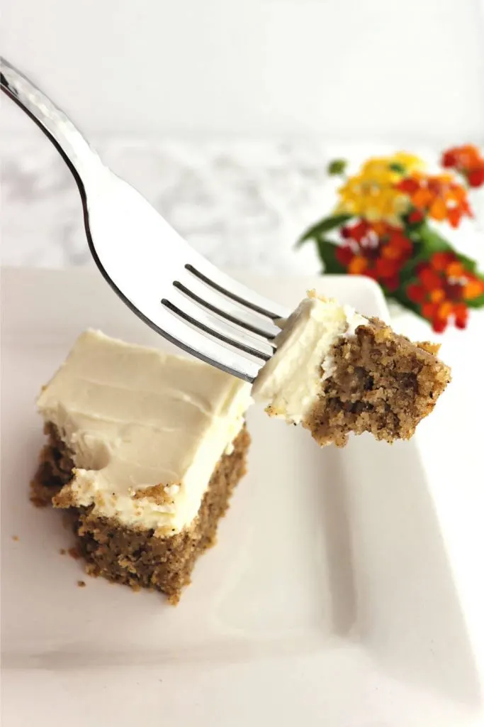 Take a bit of creamy keto spice cake. Packed with spices while gluten-free, sugar-free, and perfect as a low carb dessert. Topped with dreamy cream cheese frosting, delicious. #glutenfreecake #spicecake #ketocake