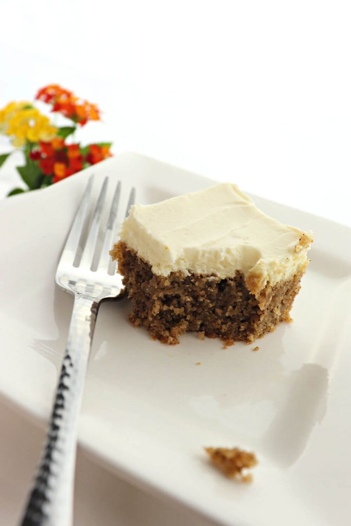 Moist gluten-free keto spice cake disappears quickly! Full of flavor, moist, with dreamy sugar-free cream cheese frosting. A fabulous low carb cake for a keto diet. #ketocakes #ketodiet #lchf