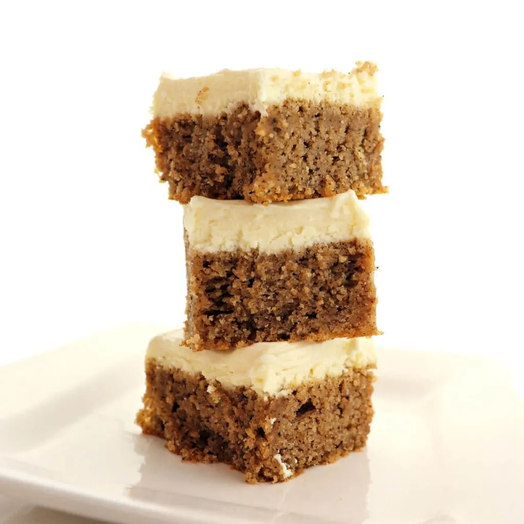Delicious low carb keto spice cake is full of fall spices and super moist. Topped with a dreamy sugar-free cream cheese frosting, it's completely gluten-free. #ketocake #lowcarbcake #ketodessertrecipes