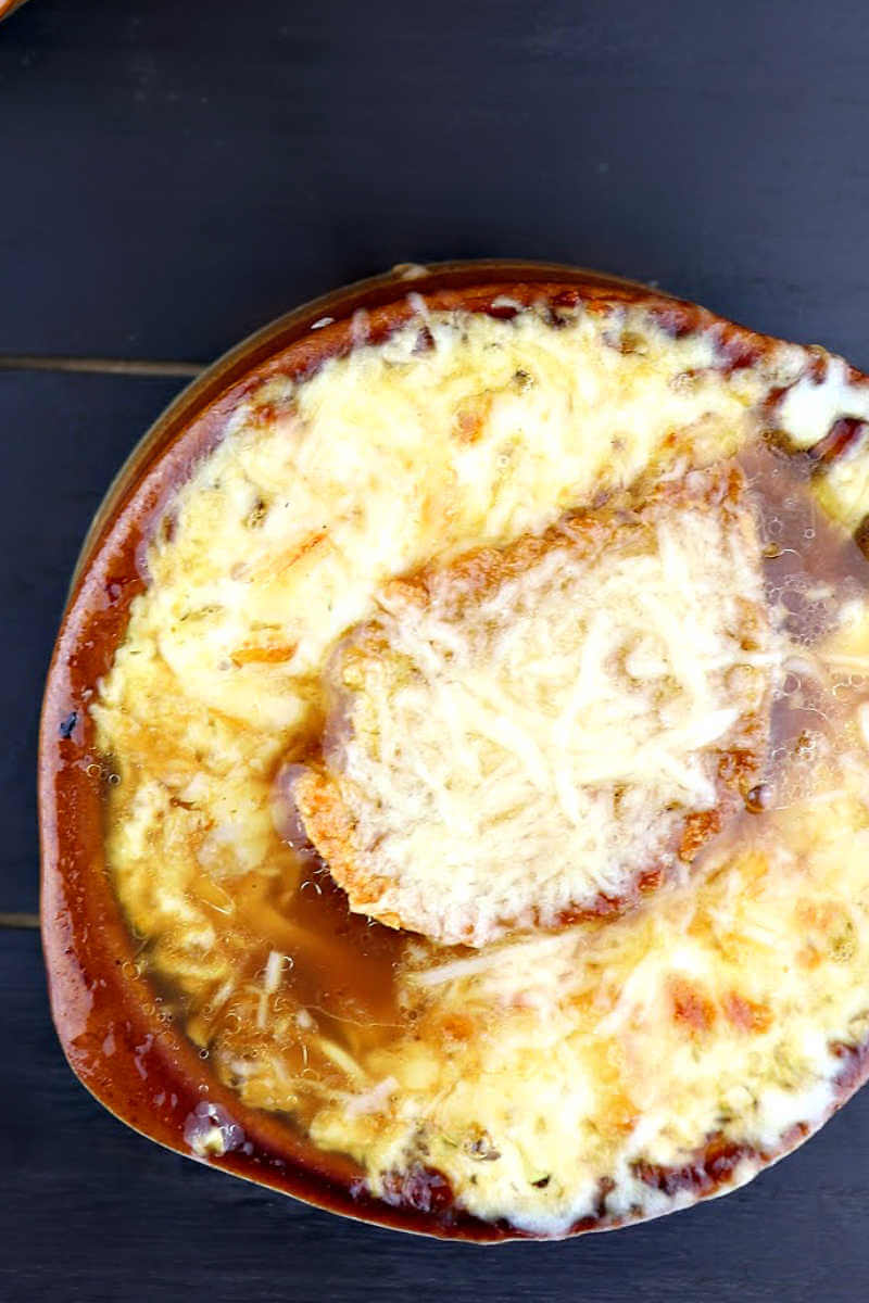 Keto French Onion Soup overhead with gruyere and garlic crostini #ketosouprecipes #ketorecipes #lowcarbsoup