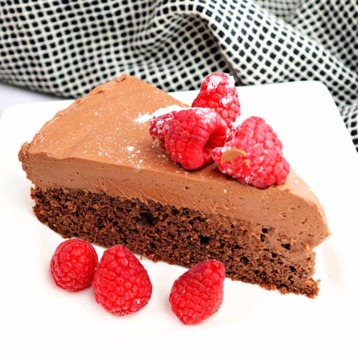 Divine keto chocolate mousse cake with raspberries is elegant and easy to put together.