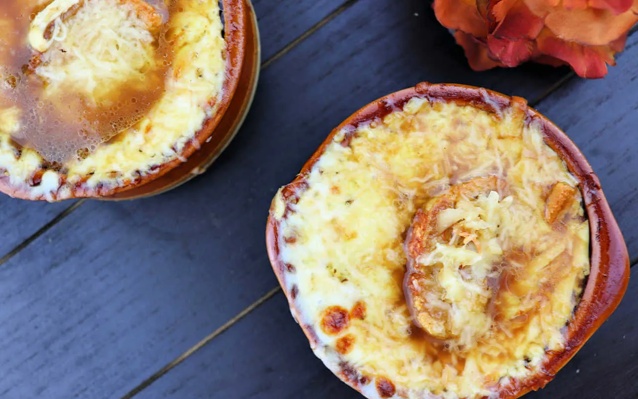 Keto French Onion Soup overhead with gruyere and garlic crostini #ketosouprecipes #ketorecipes #lowcarbsoup