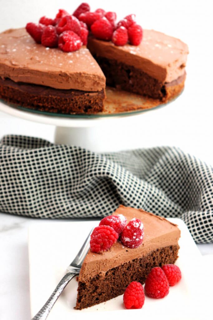 Keto chocolate mousse cake with a piece taken out.