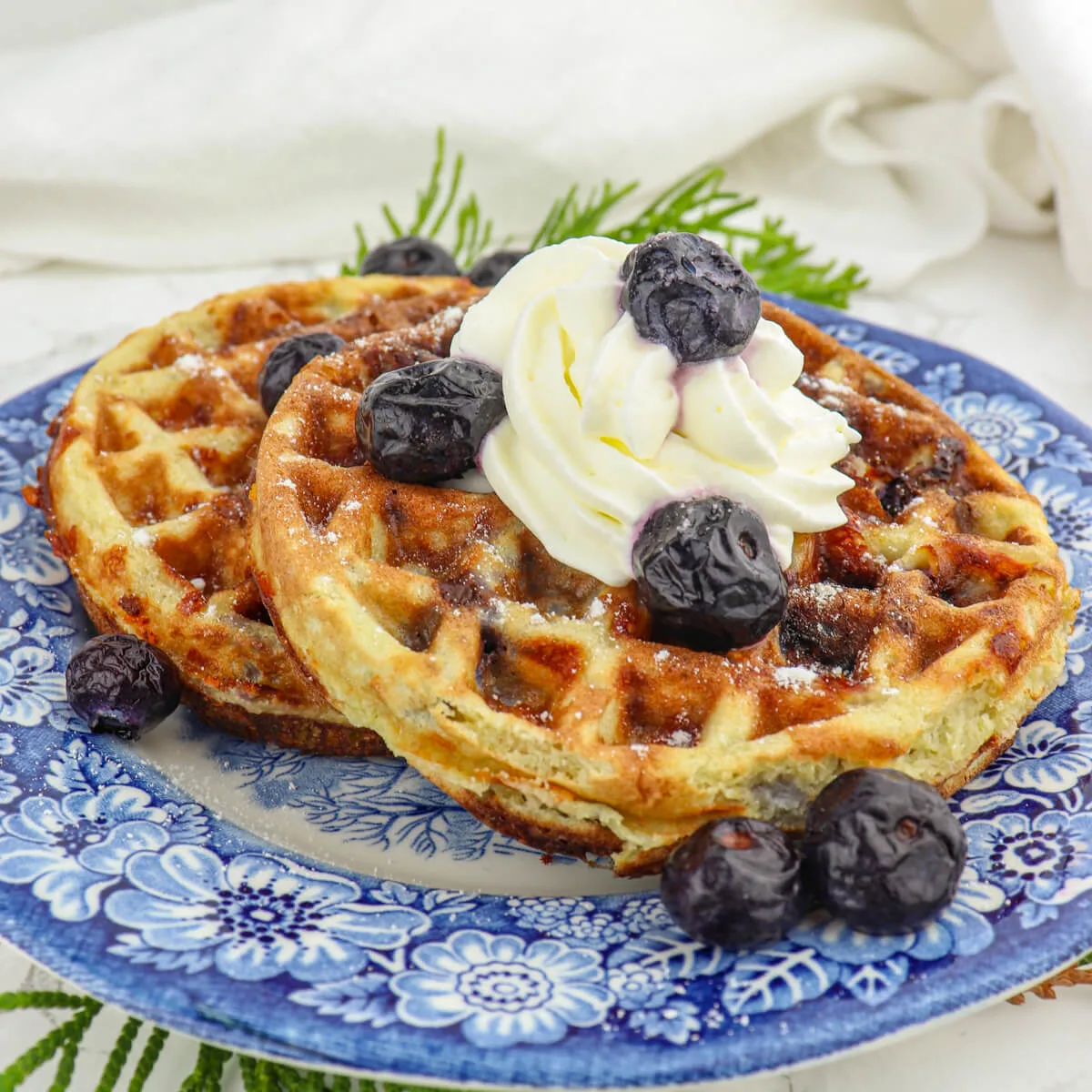 Delicious blueberry chaffles are a fabulous keto low carb breakfast! Gluten-free with classic blueberry morning flavor.