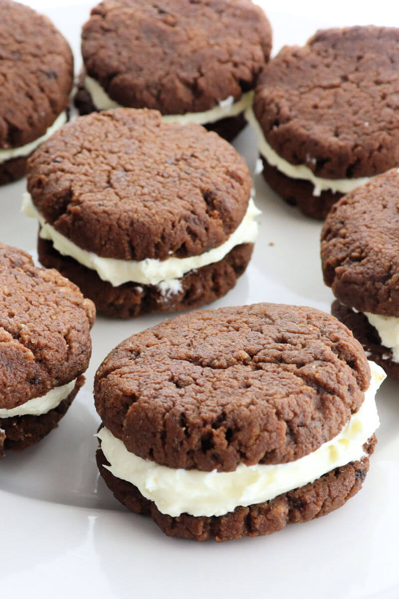 Keto Chocolate Sandwich cookies with peppermint cream cheese filling scream keto Christmas cookies. Soft and delicious. #ketocookies #lowcarbchristmas