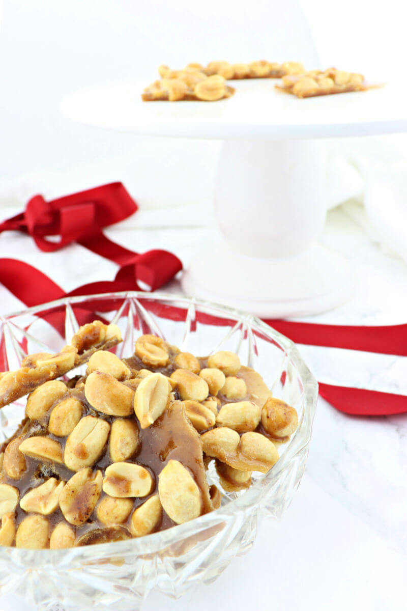 Easy keto peanut brittle will be a hit at your next low carb holiday party. Sugar-free and gluten-free with the taste of peanut salty sweet of childhood. #ketorecipes #lowcarbcandy #sugarfreepeanutbrittle