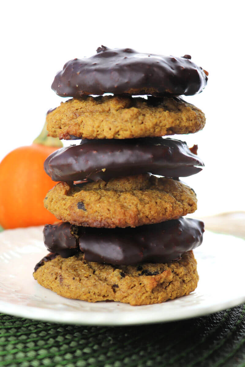 Keto pumpkin cookies dipped in sugar-free chocolate for the win! Low carb, sugar-free, gluten-free delights of spice. #ketorecipes #ketocookies