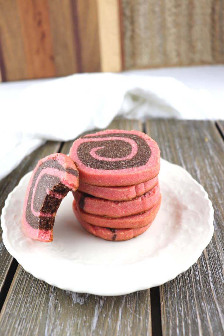 Low carb chocolate pinwheel cookies are colorful and a low carb recipe treat. Gluten-free and sugar-free fun. #ketocookies #ketorecipes 