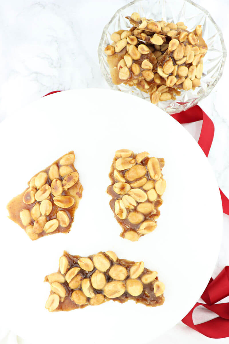 Quick sugar-free peanut brittle is special for the holidays and delicious. Perfect for a keto diet. #ketocandy #ketodessertrecipes #sugarfreecandy