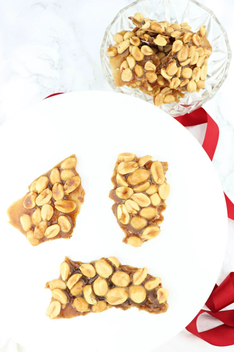 Quick sugar-free peanut brittle is special for the holidays and delicious. Perfect for a keto diet. #ketocandy #ketodessertrecipes #sugarfreecandy
