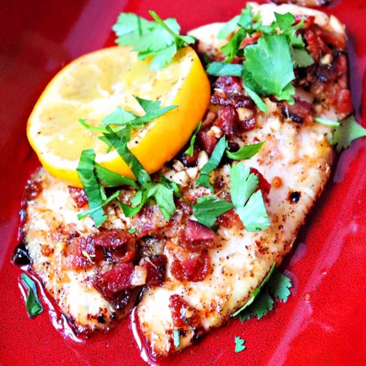 Bacon smothered keto tilapia is the ideal easy low carb family meal. #ketodinner #ketorecipes