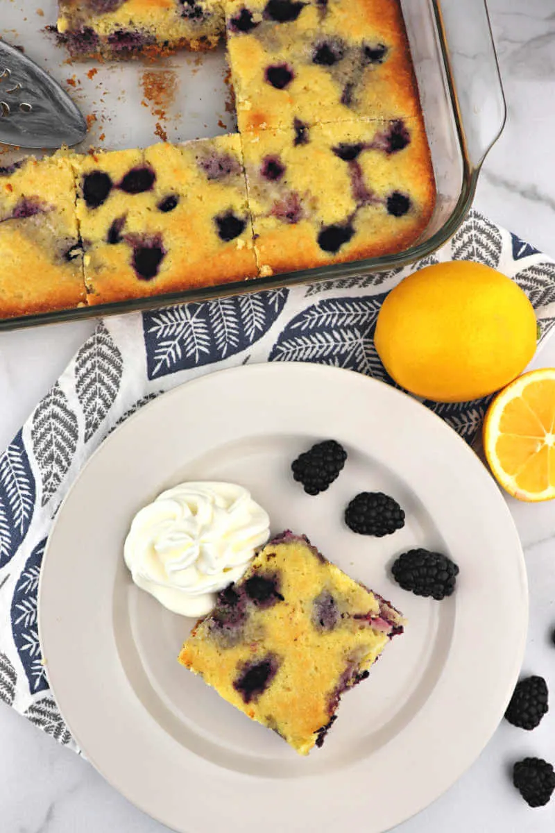 Keto blackberry cobbler evokes summer memories. Bright flavors of blackberry and lemon paired with cream make this low carb dessert. Sugar-free and gluten free for an outdoor dinner party or today. #ketoblackberrycobbler #ketodesserts #ketorecipes