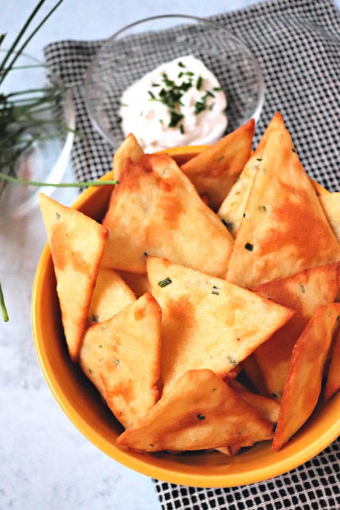 Delicious sour cream and onion keto chips are the perfect flavorful low carb snack. Gluten-free, sugar-free, and great with a keto dip. #ketosnacks #ketorecipes #ketochips