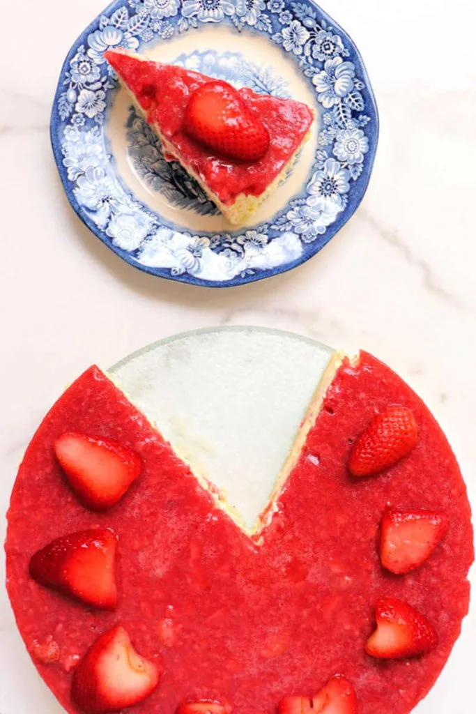 Creamy keto strawberry cheesecake is silky and delish. A sugar-free, low carb dessert at it's finest with a gluten-free almond flour crust. #ketorecipes #ketocheesecake #ketodesserts