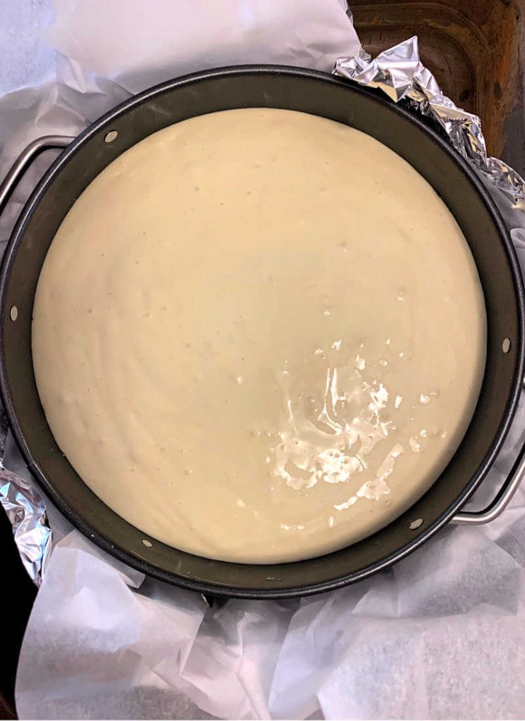 Keto cheesecake batter in the springform pan to be baked. #ketocheesecake