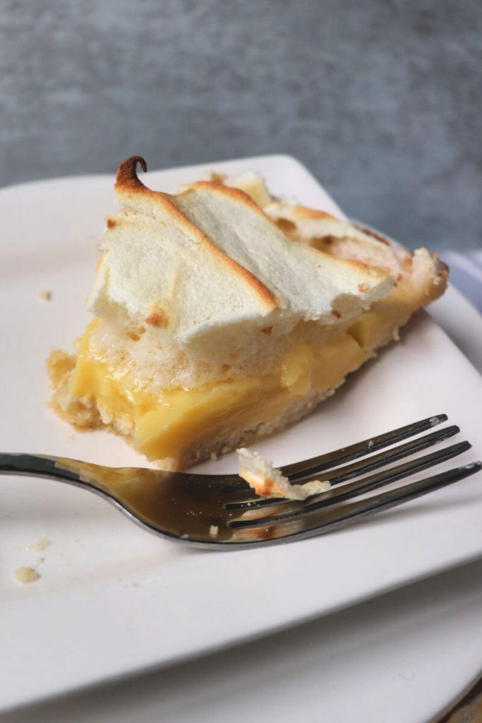 The classic sweet tart confection of summer. Keto lemon meringue pie is done with a gluten-free almond flour crust, and a lemony sugar-free filling, all topped with brilliant meringue.  #ketodesserts #ketorecipes