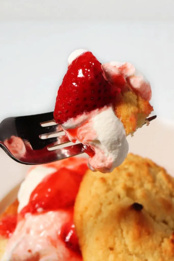 Bite of keto strawberry shortcake on a fork