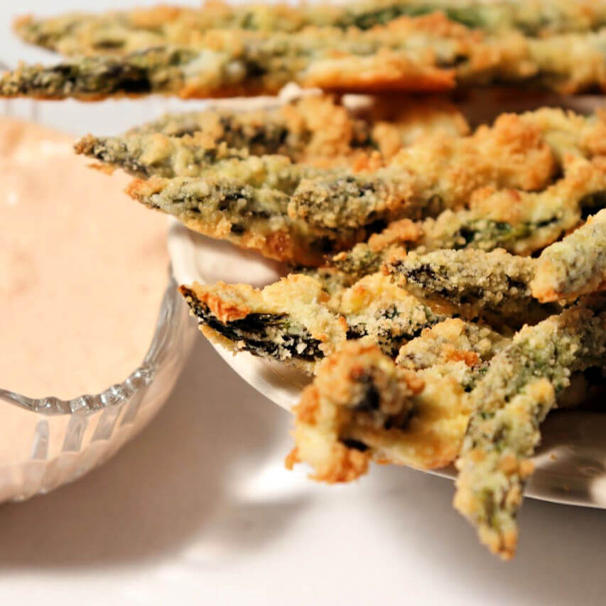 Keto asparagus fries are baked and delicious with spicy garlic dip. #ketoasparagus #ketosides