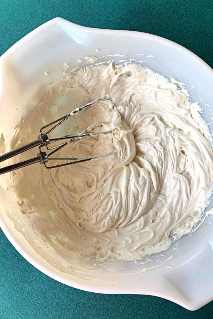 Beaters in the keto cream cheese frosting