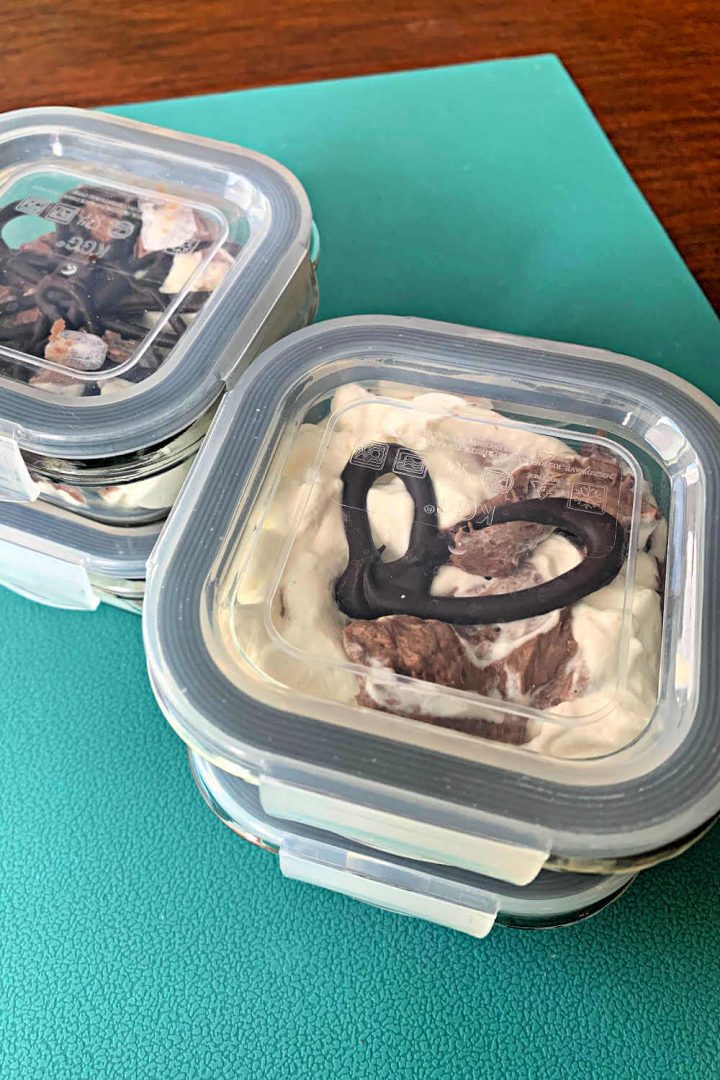 Keto chocolate mousse portioned out into containers.