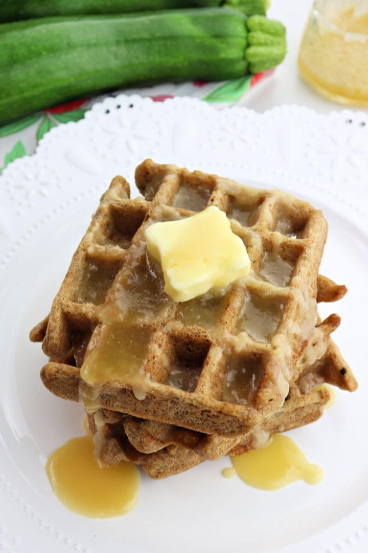 Stack of keto zucchini waffles with butter