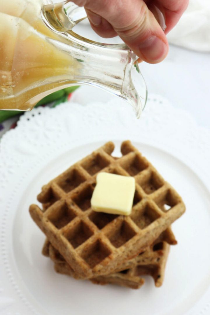 About to pour keto syrup over zucchini waffles