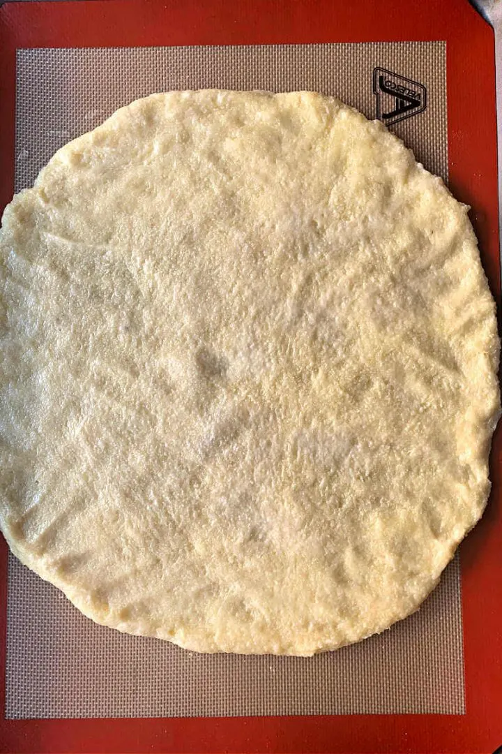 Rolled out keto pizza dough